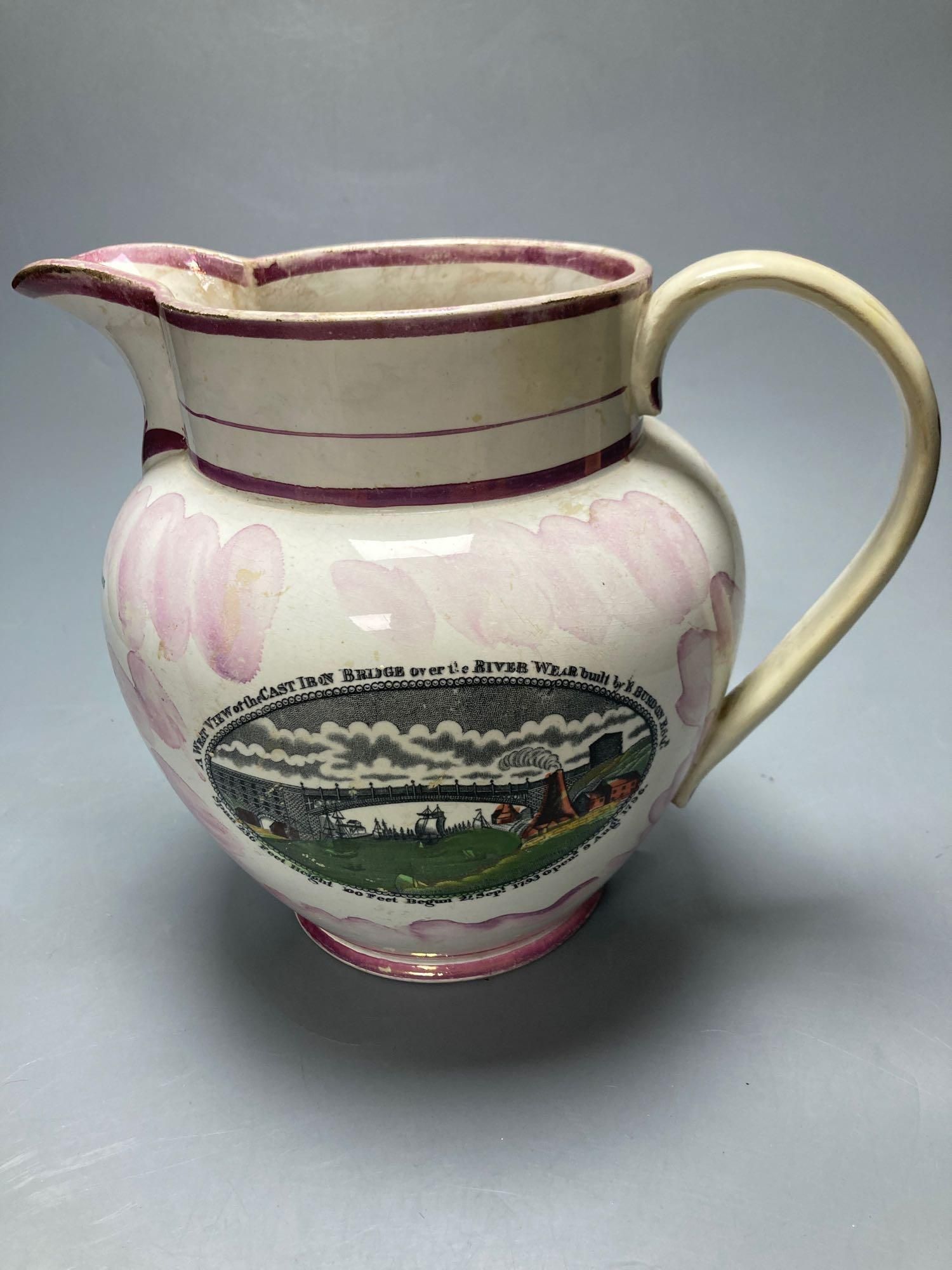 Two early 19th century Sunderland pink lustre jugs and similar bowl, transfer printed and enamelled, tallest jug 21cm